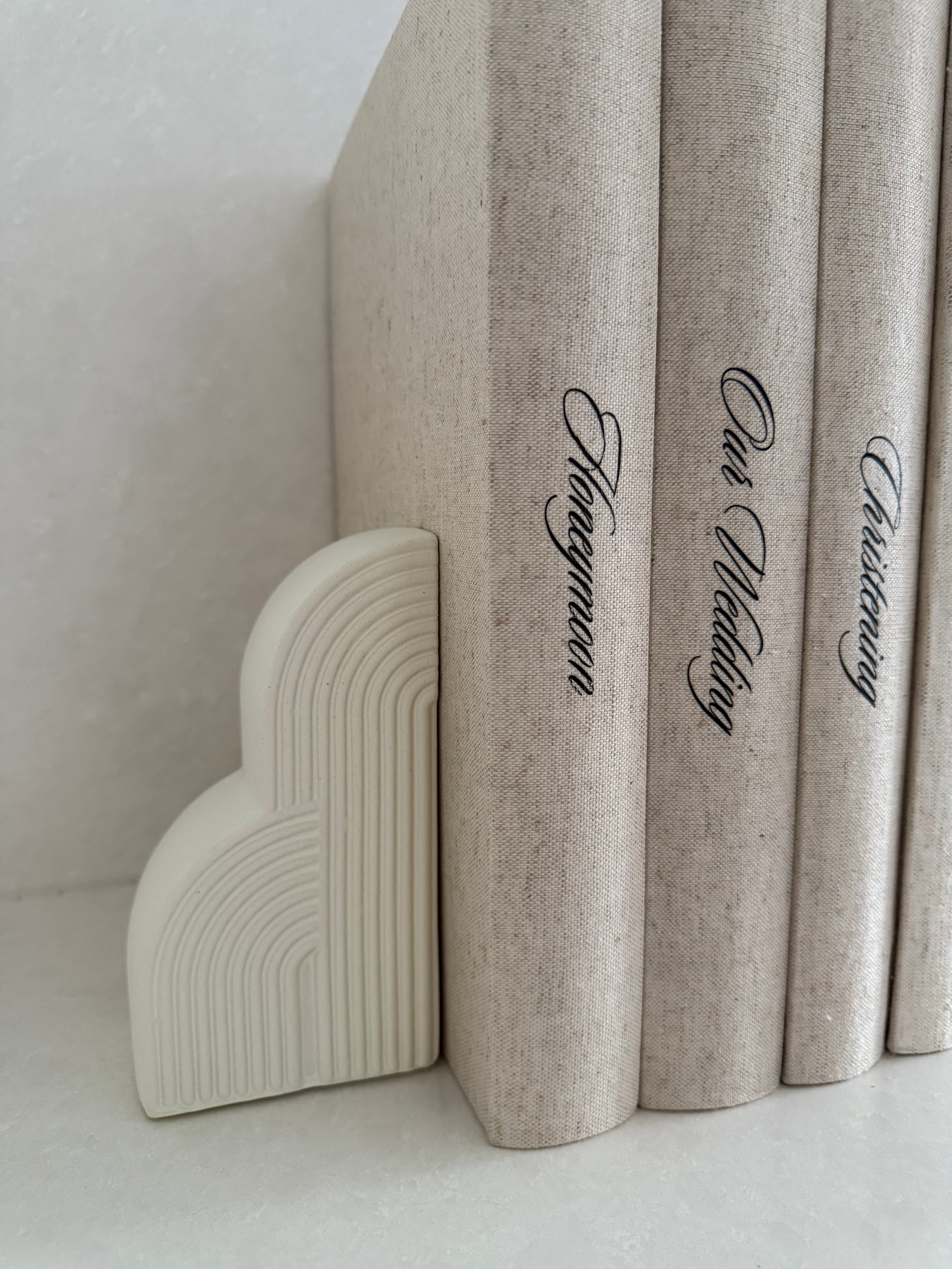 White ribbed book ends