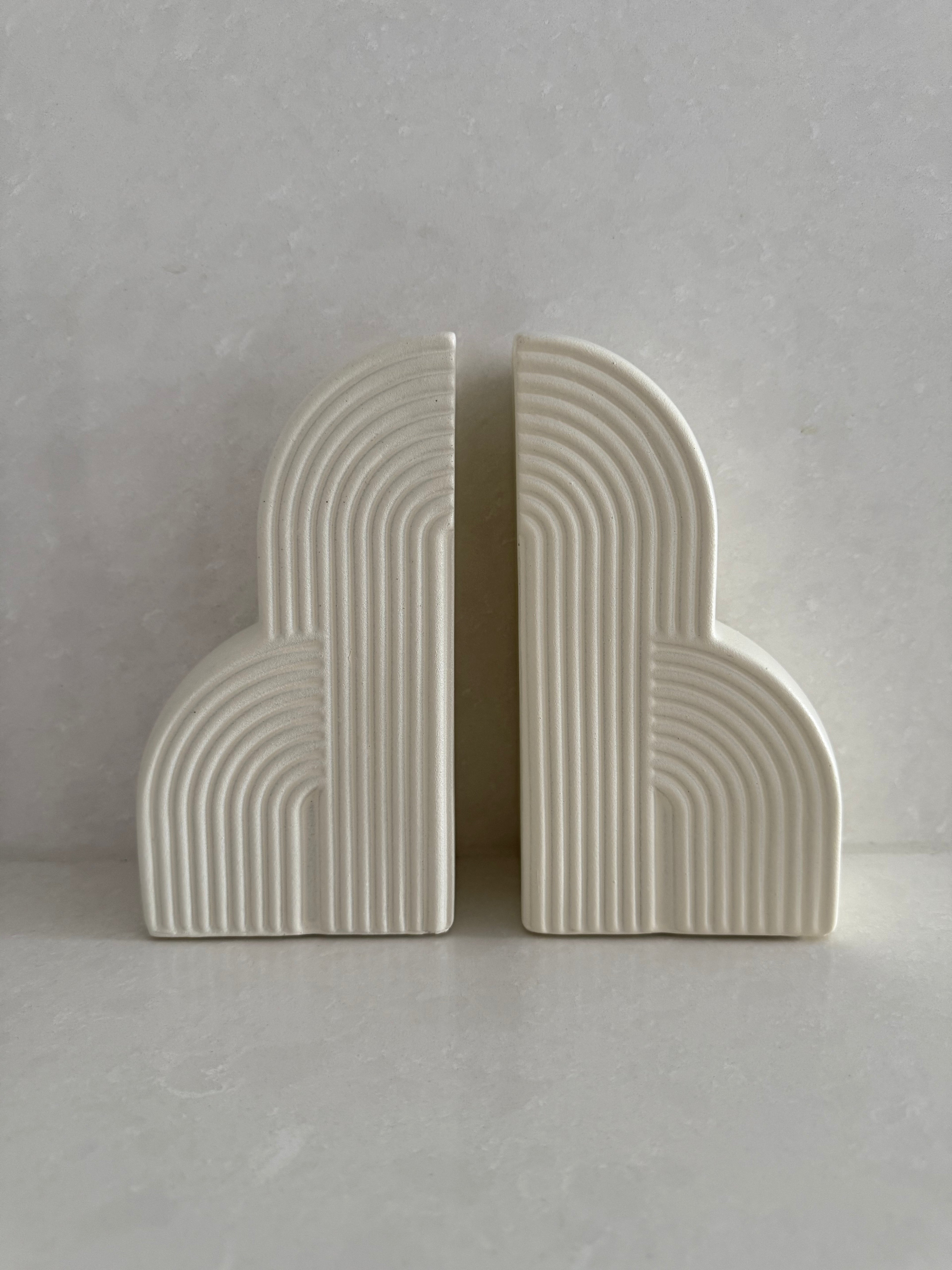 White ribbed book ends